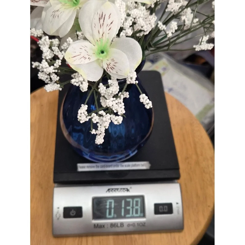 Blue Glass‎ Bud Vase with White Floral Arrangement